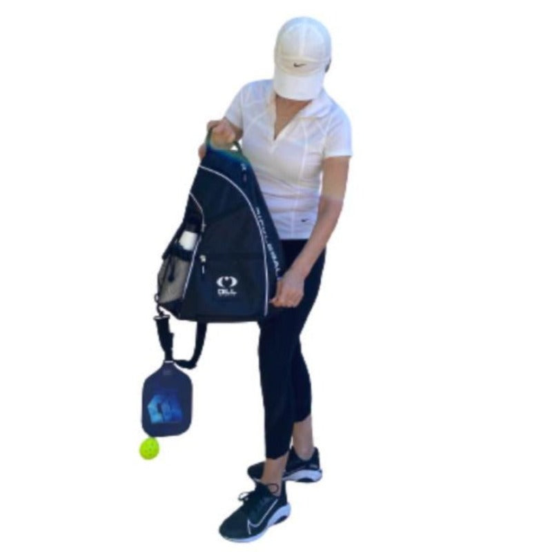 The Dill Sports Pickleball Crossbody Sling Bag features easy slide zippers, two side pockets for paddles, balls and accessories, one water bottle holder, two front pockets for your phone, keys, energy bars, other accessories and one back pocket.