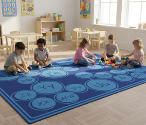 Miss Bubbles Teaches Her Students on an Alphabet Carpet