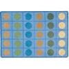 Rectangular rug with a grid pattern of colored circles on a blue background. Calming Seating Circles Rug