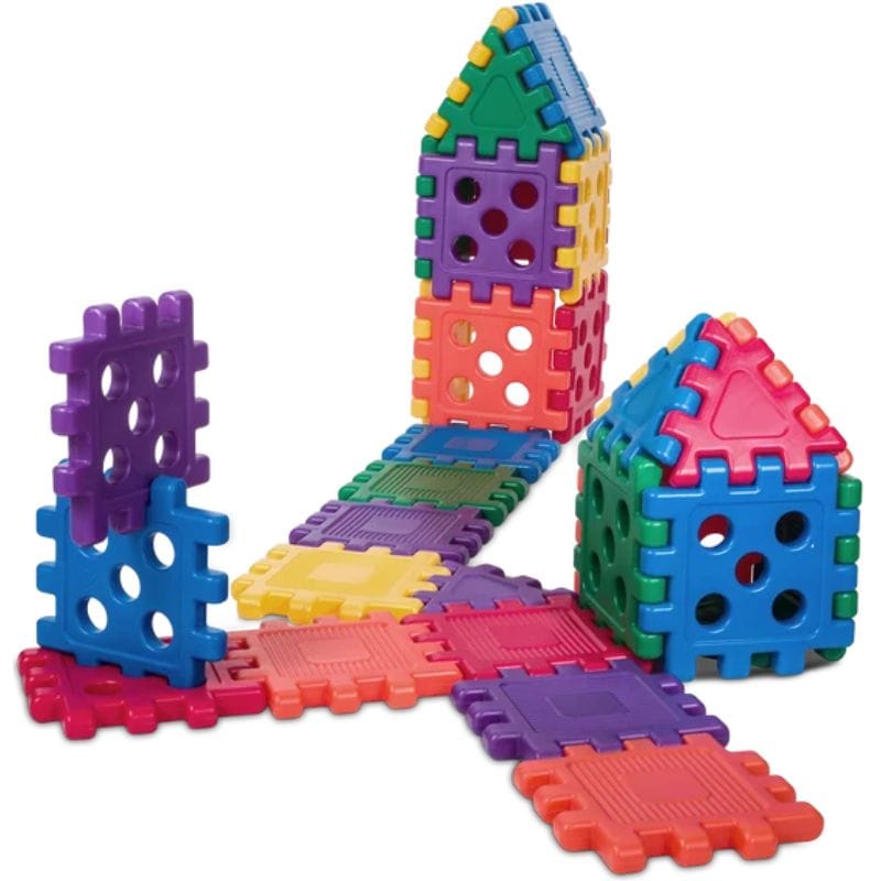Multicolor plastic building toy blocks arranged to form two house-shaped towers and a connected base, photographed on a plain white background.