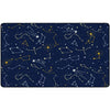 A rectangular area rug featuring a dark navy blue space-themed pattern with white and yellow constellations, stars, and shooting stars.
