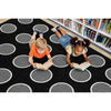 Two children reading books on a black circular patterned rug in a library. Night Clouds by SensoyrEdge