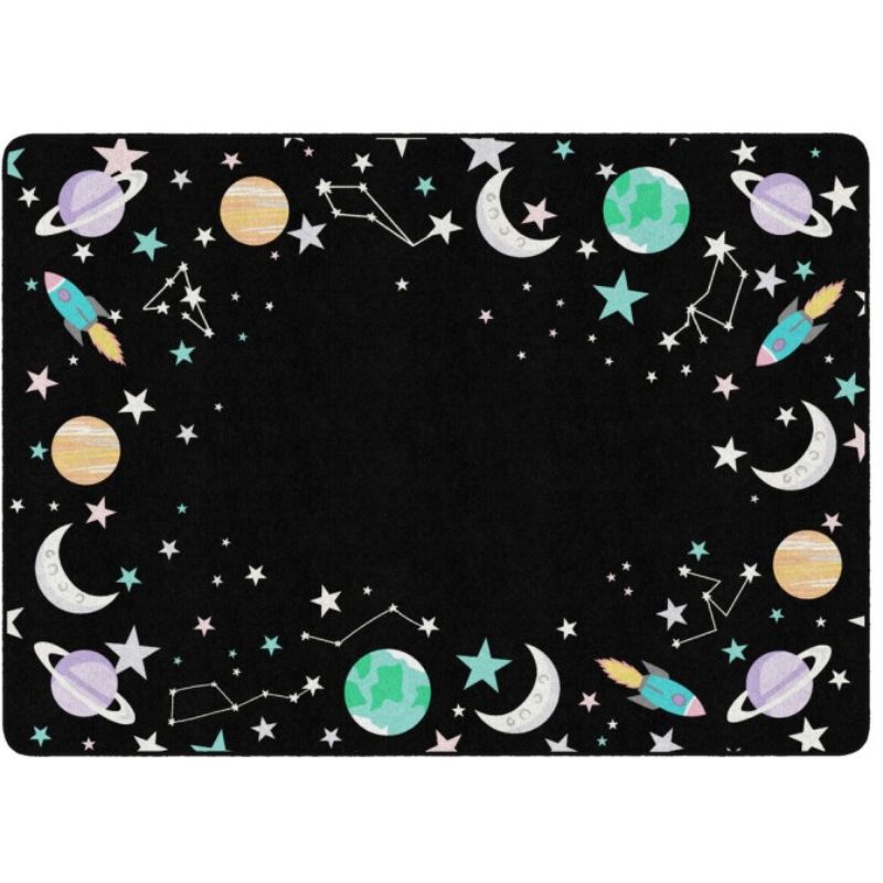 A rectangular black area rug with a colorful outer border featuring space-themed illustrations including planets, stars, crescent moons, rockets, and constellations.