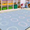 Circle Sampler Pastel on Blue Classroom Rug