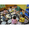 compostion book rug with teacher and kids