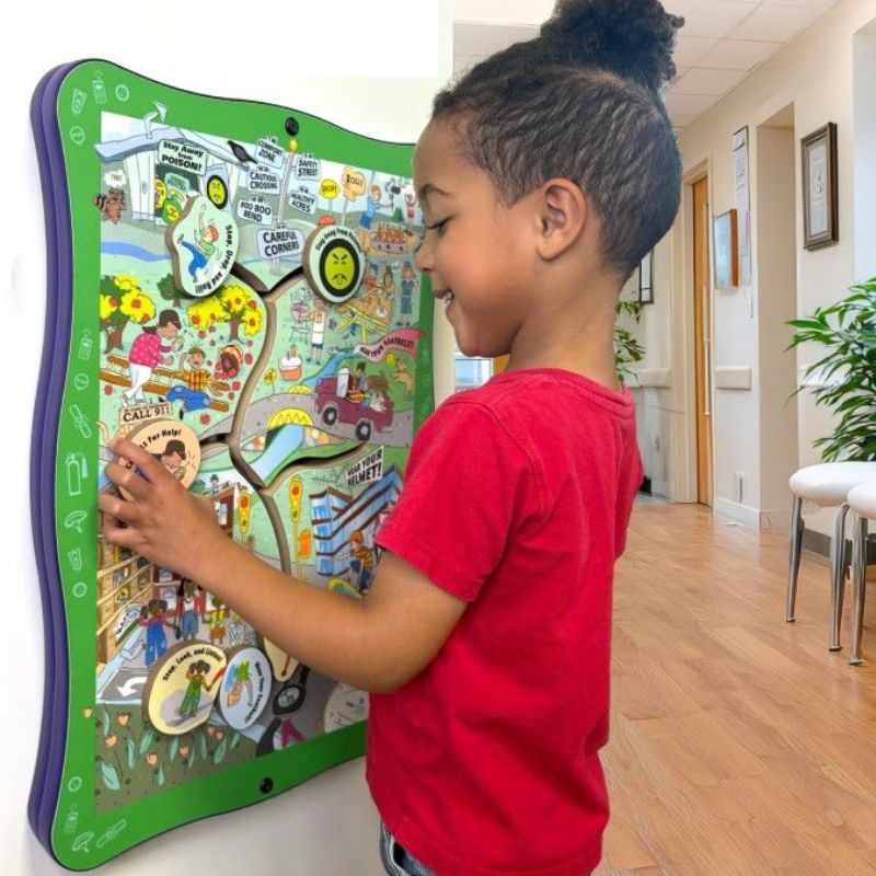 Child interacting with a colorful magnetic board safety_road_wall_toy in a waiting area setting