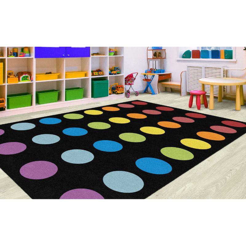 The Rainbow Spots Criss Cross Rug has child friendly colors on a crisp black background. Kids will love learning and playing on this classroom ready rug. 